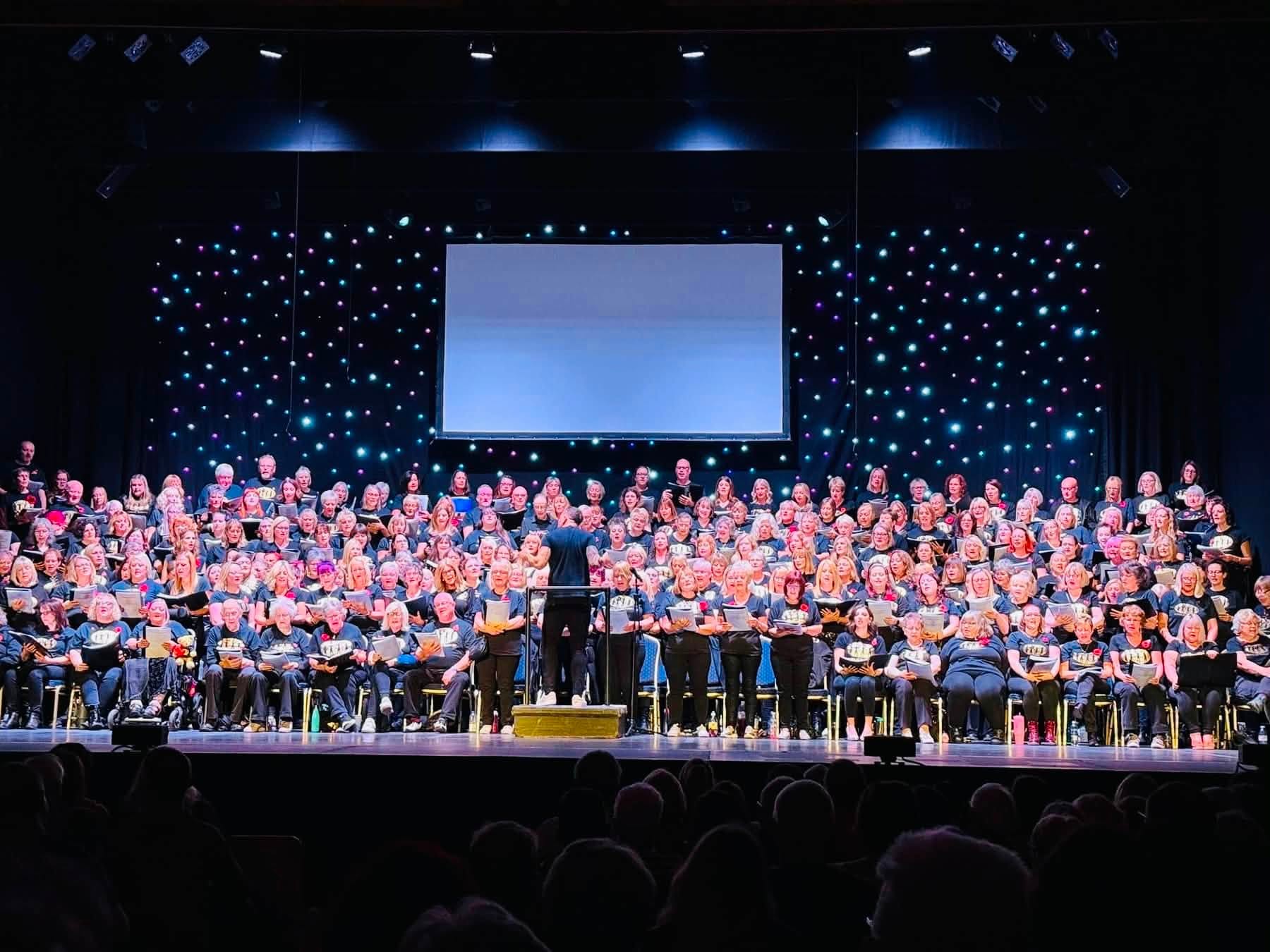 Voices of Yorkshire members singing together